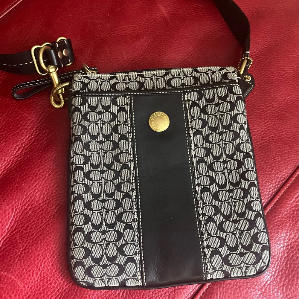 Coach cross body purse.